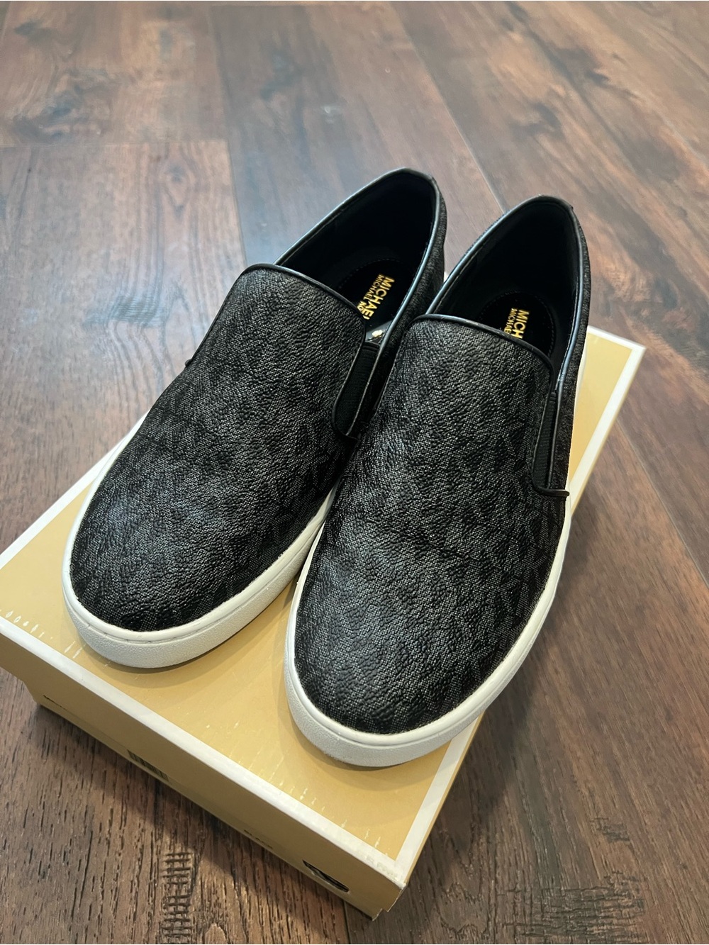 Michael Kors Black Monogram Slip-On Sneakers